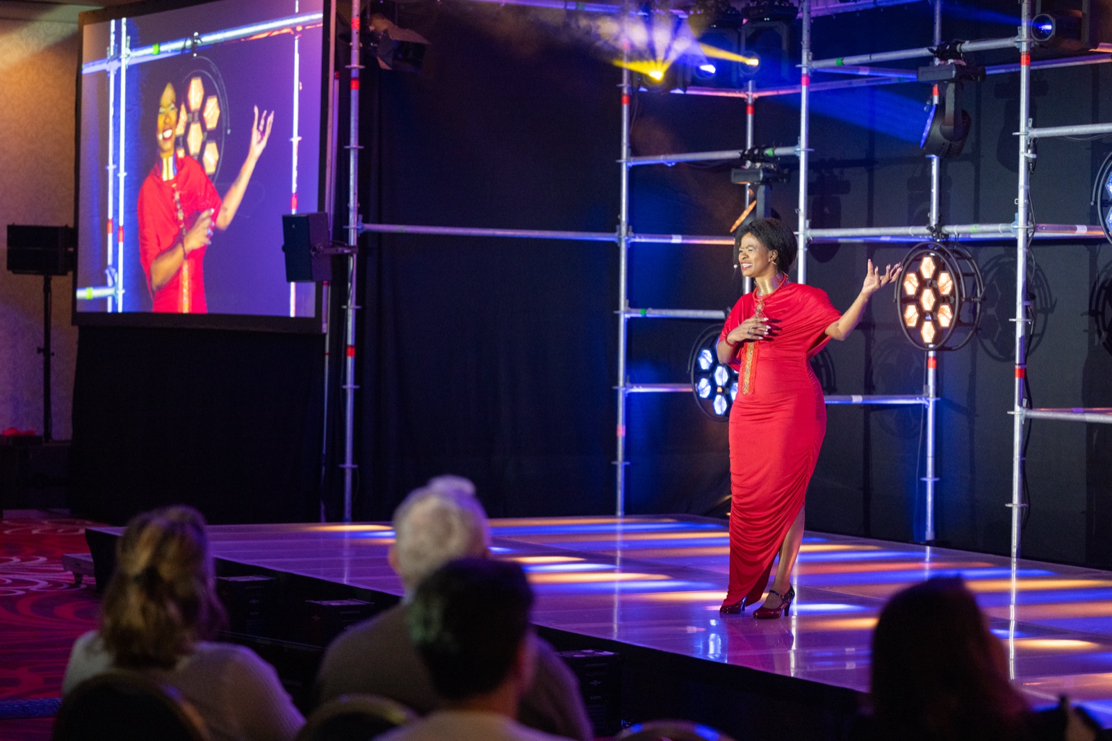 Tae Betty on stage, before an audience
