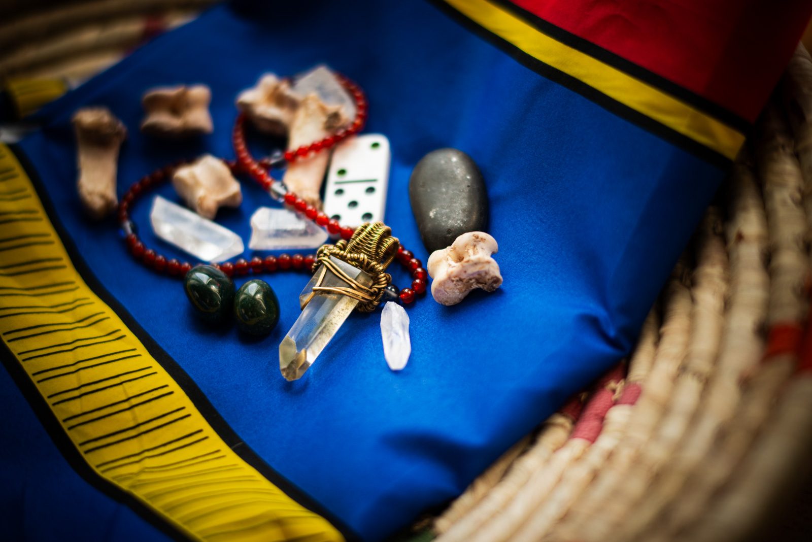 Sangoma tools — stones, bones and cloth on a blanket